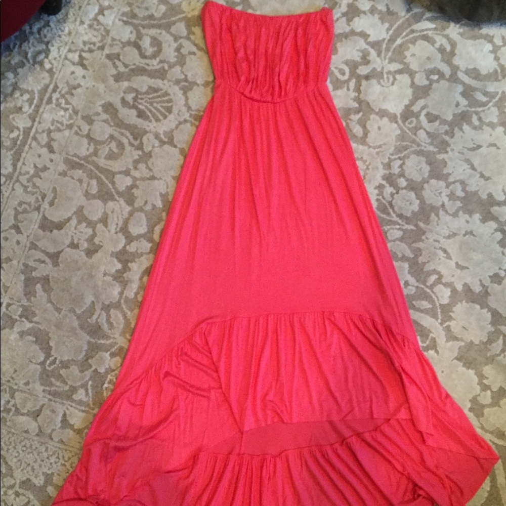Sleeveless, full, salmon dress with bottom ruffle